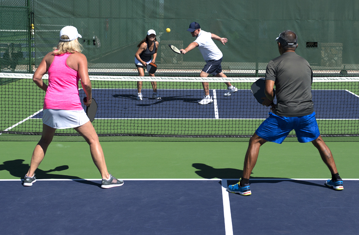 Pickleball - Mixed Doubles Action of Colorful Court